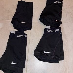 Four pack of Nike pros black